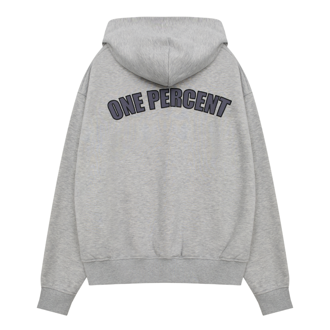 A grey oversized hoodie with a bold arched text design on the back that reads 'ONE PERCENT' in black, capitalised letters. The hoodie features a relaxed fit with a spacious hood, ribbed cuffs, and a ribbed hem, embodying a modern streetwear aesthetic. The neutral colour and minimalist design make it versatile for casual wear, urban fashion, and athleisure. The premium fabric and clean construction suggest high-quality craftsmanship, ideal for those seeking stylish and comfortable apparel.