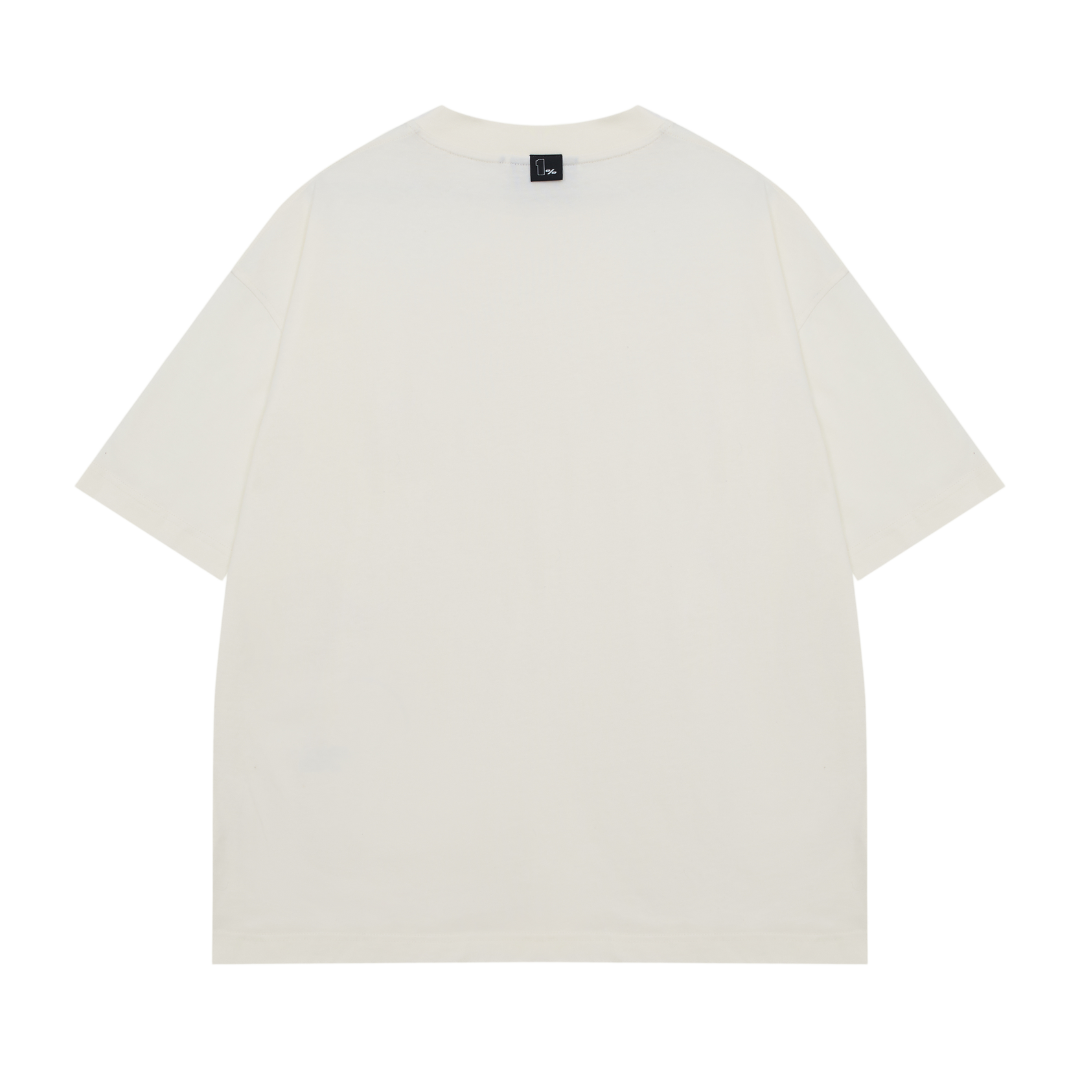 A off-white 1% club oversized t-shirt with a minimalist streetwear design, displayed against a transparent background. The t-shirt features a small black tag on the collar  with the text '1%' and an arched phrase that reads 'THE ONE PERCENT CLUB.' The relaxed fit, dropped shoulders, and premium fabric create a modern and stylish silhouette. The clean aesthetic and neutral colour make it versatile for casual wear, high-end street fashion, and luxury minimalist apparel.